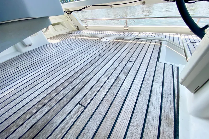 Slide: The Image of Teak deck of 2016 Beneteau Oceanis 41 yacht, showcasing elegant wood finish. - 24