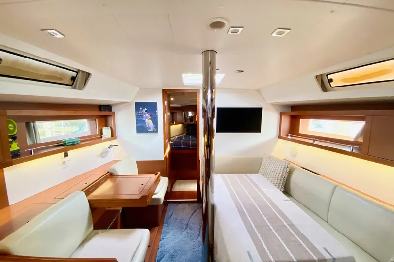 Slide: The Image of Interior of 2016 Beneteau Oceanis 41 yacht, featuring elegant seating and modern design. - 28