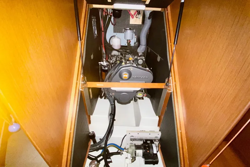 Slide: The Image of Engine compartment of a 2016 Beneteau Oceanis 41 sailboat, featuring a Yanmar engine. - 50