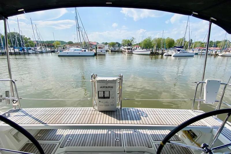 Slide: The Image of Beneteau Oceanis 41 sailboat deck view, marina background, sunny day, 2016 model. - 25
