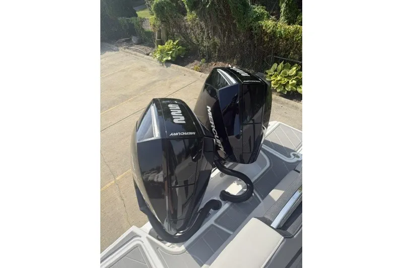 Slide: The Image of Twin Mercury outboard engines on a 2027 Monterey Elite 27 OB boat. - 20