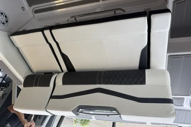 Slide: The Image of 2027 Monterey Elite 23 SD boat interior with sleek, modern seating design. - 31
