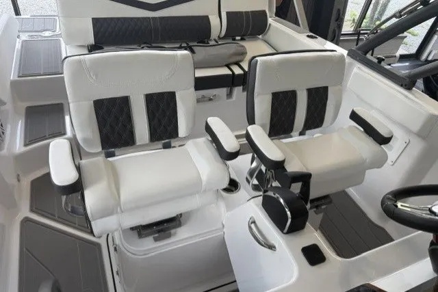 Slide: The Image of Luxury seating in 2027 Monterey Elite 23 SD boat cockpit, featuring modern design and comfort. - 33