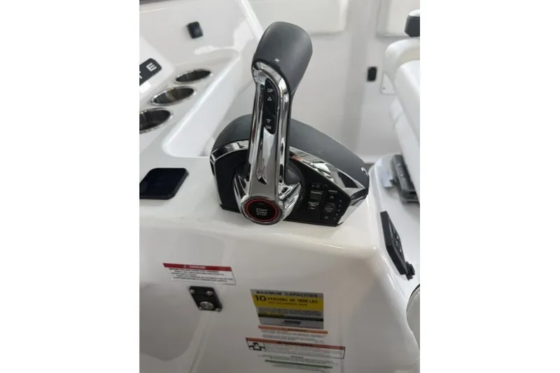 Slide: The Image of Throttle control of a 2027 Monterey Elite 23 SD boat, featuring sleek design and modern controls. - 18