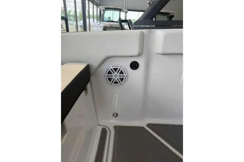 Slide: The Image of Interior of 2027 Monterey Elite 23 SD boat with speaker and seating. - 30