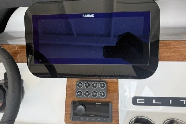 Slide: The Image of Dashboard of 2027 Monterey Elite 23 SD with Simrad display and controls. - 28