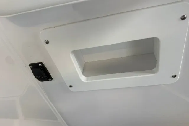 Slide: The Image of Ceiling compartment in 2027 Monterey Elite 23 SD boat interior. - 29