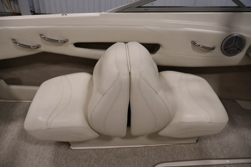 Slide: The Image of 2008 Maxum 1900 SR3 boat interior with beige leather seats and chrome accents. - 29