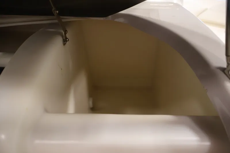 Slide: The Image of Storage compartment of a 2008 Maxum 1900 SR3 boat, open and empty. - 26