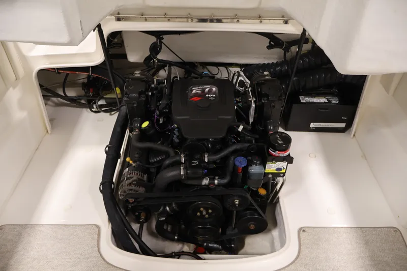 Slide: The Image of 2008 Maxum 1900 SR3 engine compartment showcasing a well-maintained MerCruiser engine. - 32