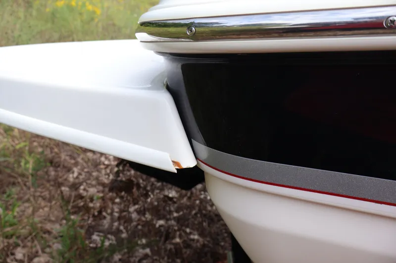 Slide: The Image of Close-up of 2008 Maxum 1900 SR3 boat hull with white and black detailing. - 44