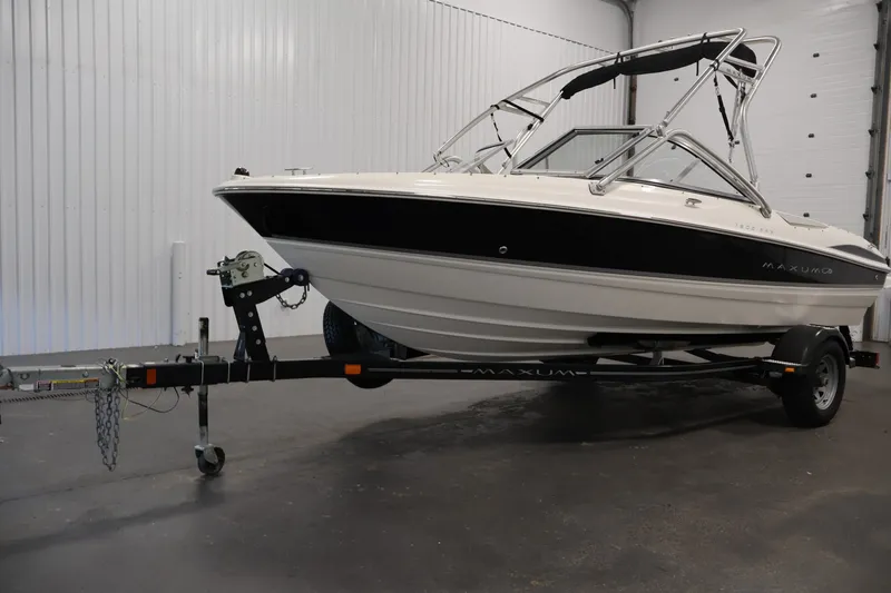 Slide: The Image of 2008 Maxum 1900 SR3 boat on trailer in indoor storage facility. - 41