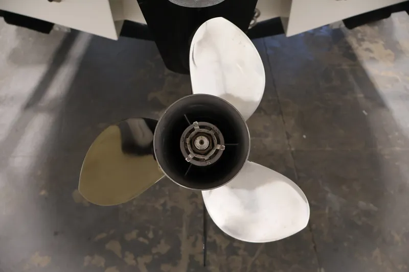 Slide: The Image of Close-up of a 2008 Maxum 1900 SR3 boat propeller on a concrete floor. - 38