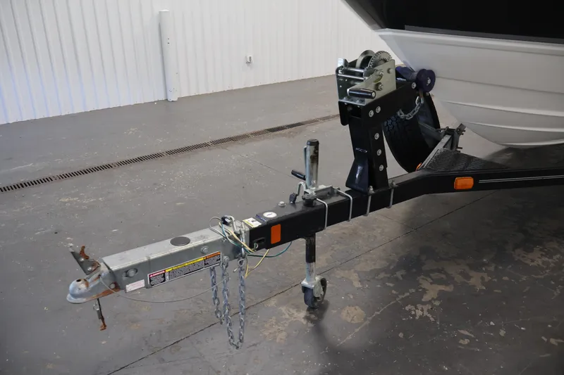 Slide: The Image of Trailer hitch of a 2008 Maxum 1900 SR3 boat in a garage setting. - 39