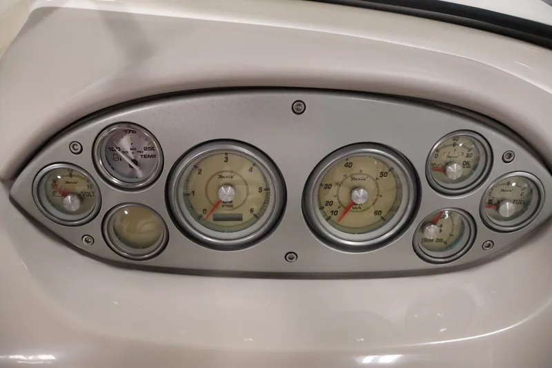 Slide: The Image of Dashboard gauges of a 2008 Maxum 1900 SR3 boat, displaying speed, fuel, and temperature. - 19