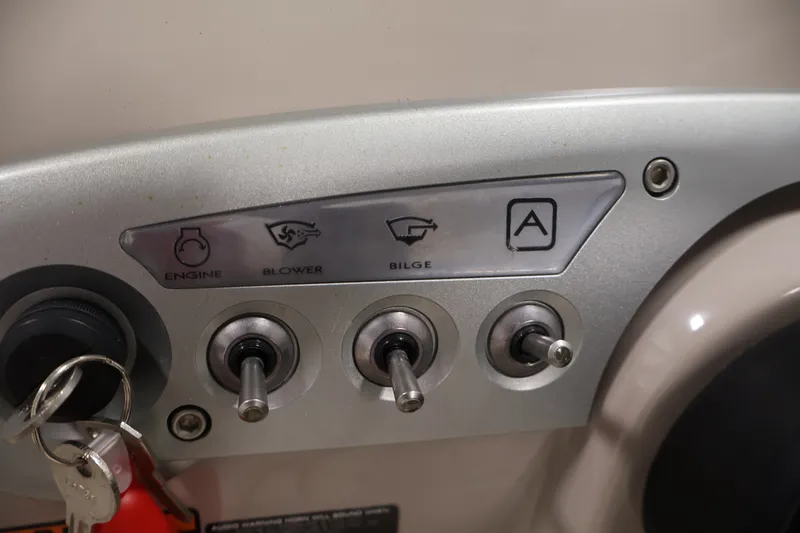 Slide: The Image of Control panel of a 2008 Maxum 1900 SR3 boat with engine, blower, and bilge switches. - 20