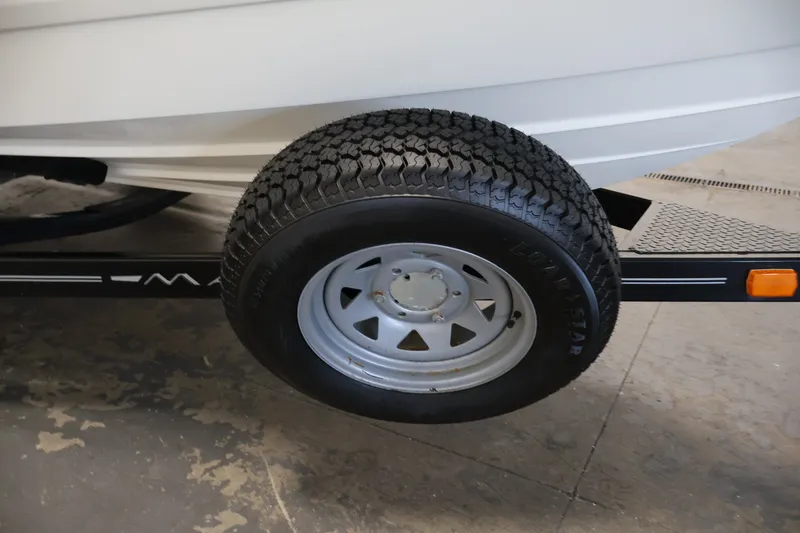 Slide: The Image of Trailer tire of 2008 Maxum 1900 SR3 boat on a metal trailer. - 40
