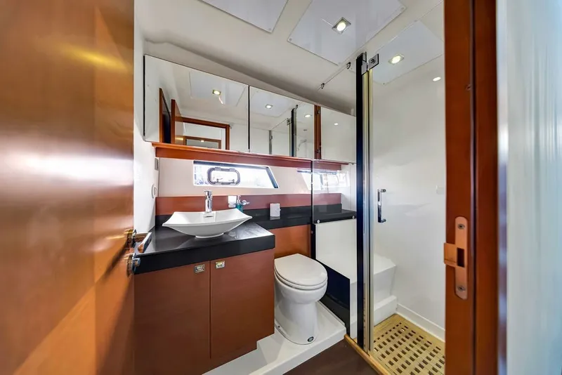 Slide: The Image of Luxurious bathroom interior of 2013 Prestige 550 yacht with modern fixtures and elegant design. - 80