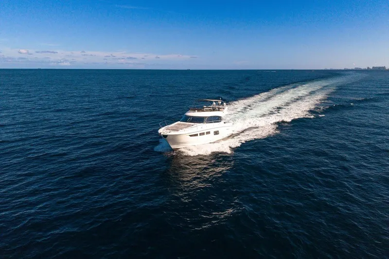 Slide: The Image of Luxury yacht Prestige 550 cruising on open sea, 2013 model. - 14