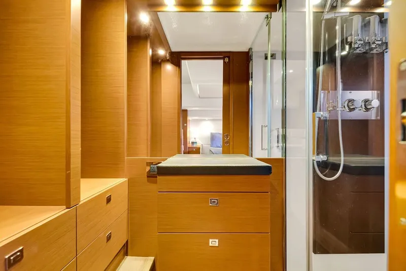 Slide: The Image of Luxurious interior of 2013 Prestige 550 yacht featuring wood cabinetry and modern shower. - 66