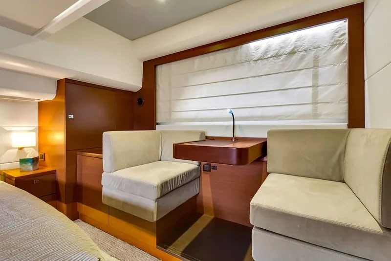 Slide: The Image of Luxurious interior of 2013 Prestige 550 yacht with elegant seating and ambient lighting. - 60