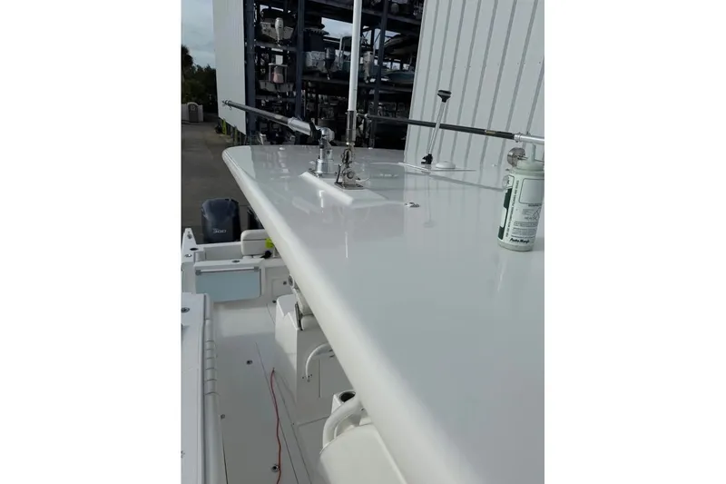 Slide: The Image of 2018 Buddy Davis boat deck with fishing rod holders and equipment. - 10