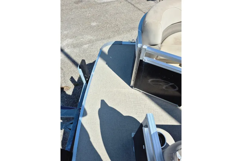 Slide: The Image of 2021 Avalon VLS 2080 QL pontoon boat deck with seating and railing. - 25