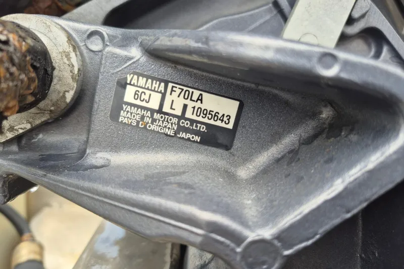 Slide: The Image of Close-up of Yamaha F70LA engine label on Avalon VLS 2080 QL, 2021 model. - 4