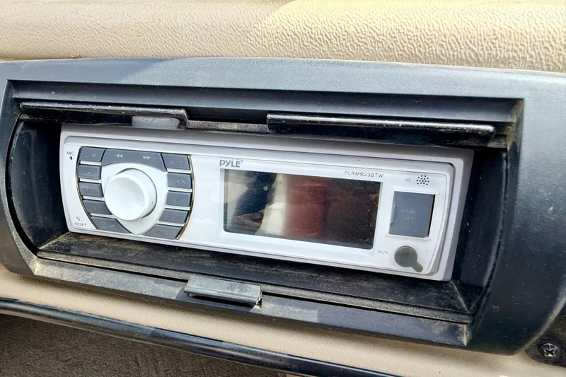 Slide: The Image of Pyle marine stereo system in a 2008 G3 Angler V185 FS boat dashboard. - 42