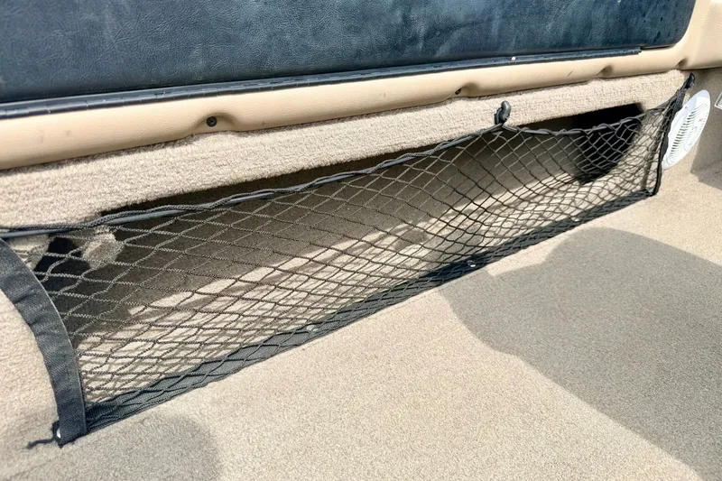 Slide: The Image of Interior storage netting in a 2008 G3 Angler V185 FS boat. - 71