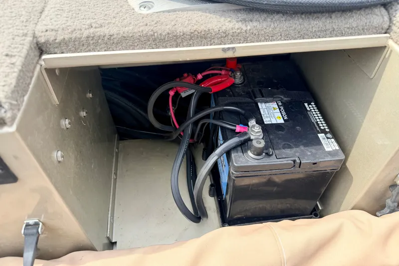 Slide: The Image of Battery compartment of 2008 G3 Angler V185 FS boat with visible wiring. - 74
