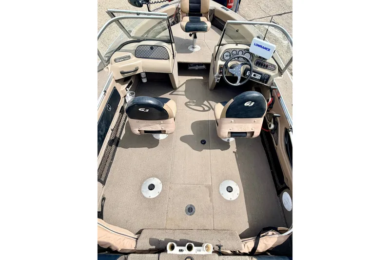 Slide: The Image of 2008 G3 Angler V185 FS boat interior with steering wheel and seating. - 52