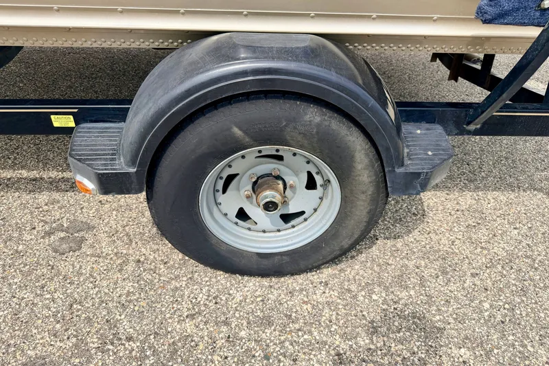 Slide: The Image of Trailer wheel of 2008 G3 Angler V185 FS on asphalt surface. - 82