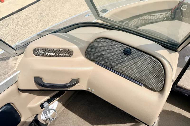 Slide: The Image of Dashboard of a 2008 G3 Angler V185 FS boat with beige interior and logo. - 46