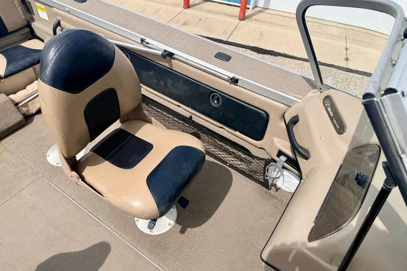 Slide: The Image of 2008 G3 Angler V185 FS boat interior with beige and black seating. - 45