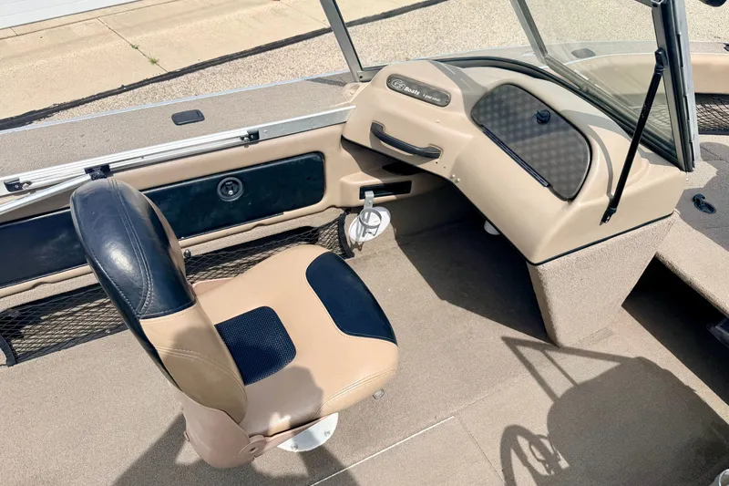 Slide: The Image of 2008 G3 Angler V185 FS boat interior with beige and black seating. - 35