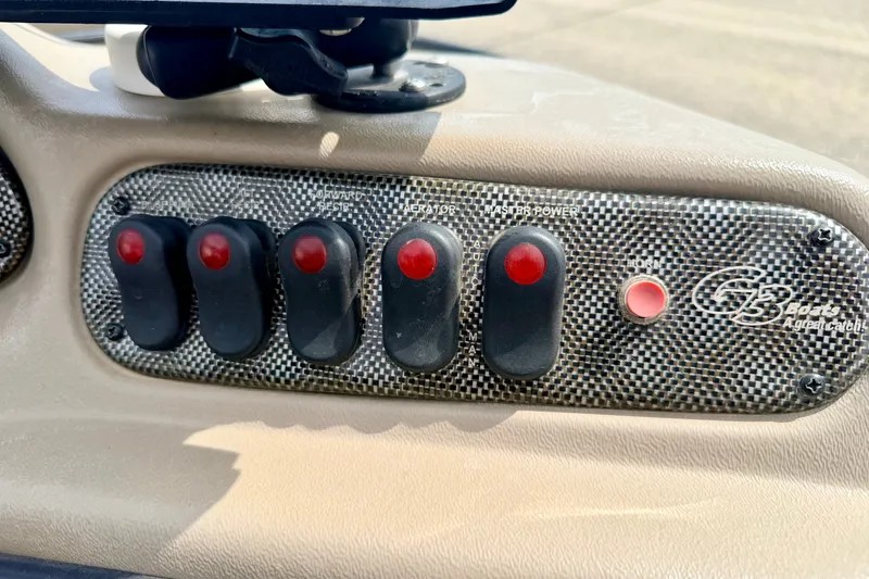 Slide: The Image of Control panel of 2008 G3 Angler V185 FS boat with switches and buttons. - 40
