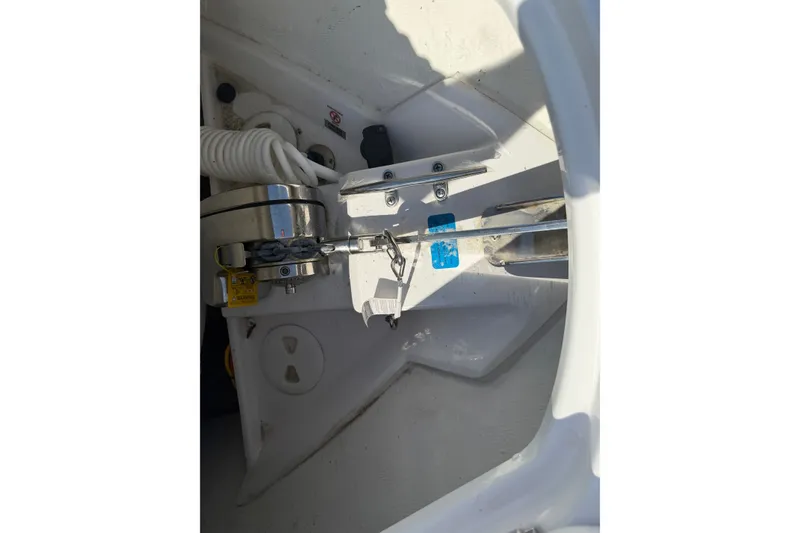 Slide: The Image of 2025 Sportsman Open 262 Center Console boat interior detail showing anchor mechanism. - 24