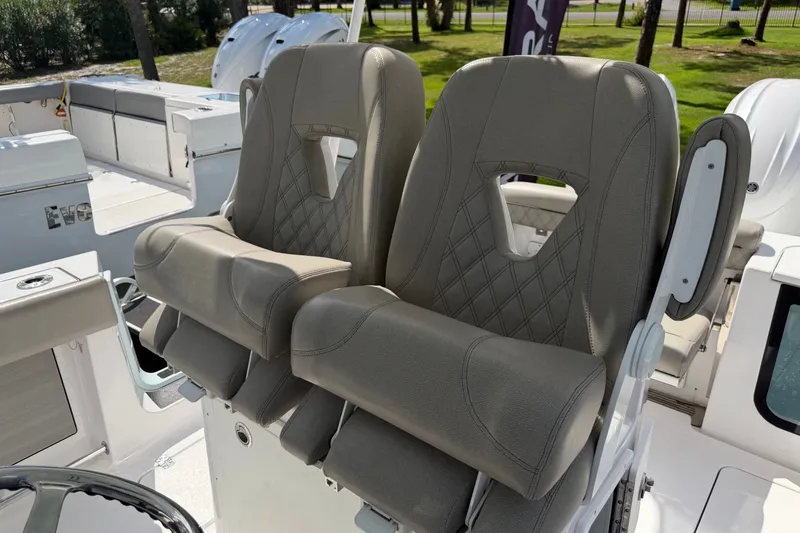Slide: The Image of 2025 Sportsman Open 262 Center Console boat seats, featuring luxurious design and comfort. - 31