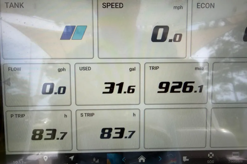 Slide: The Image of Dashboard display of a 2025 Sportsman Open 262 Center Console boat showing trip data. - 14
