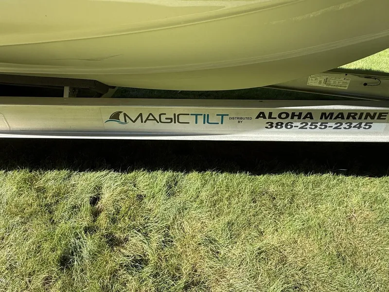 Slide: The Image of A 2023 Key West 263 FS boat on a Magic Tilt trailer. - 40