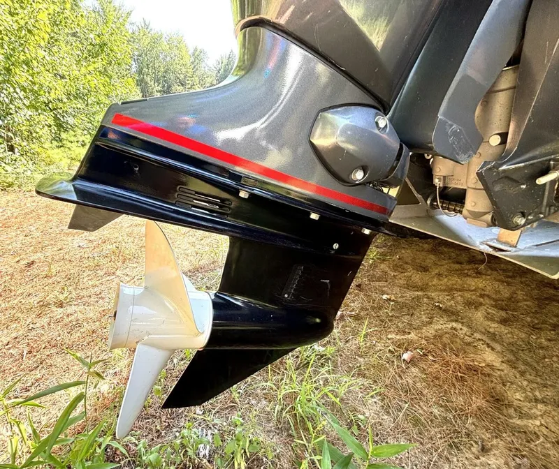 Slide: The Image of Close-up of a boat propeller on dry grass. - 32