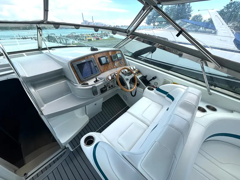Slide: The Image of The image shows the cockpit of a 2006 Formula 400 Super Sport with a sleek helm station. - 25