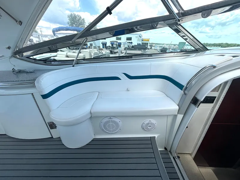 Slide: The Image of The image shows the cockpit of a 2006 Formula 400 Super Sport with white seating and blue accents. - 24