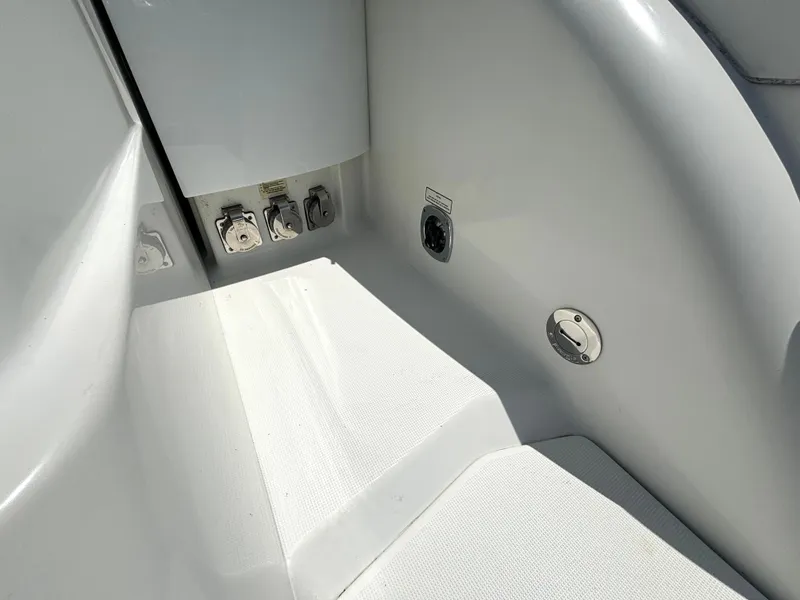 Slide: The Image of Close-up of a white boat deck with connectors and covers. - 16