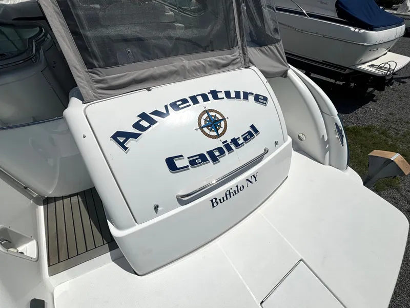 Slide: The Image of Stern of a boat named "Adventure Capital" with location "Buffalo NY." - 14