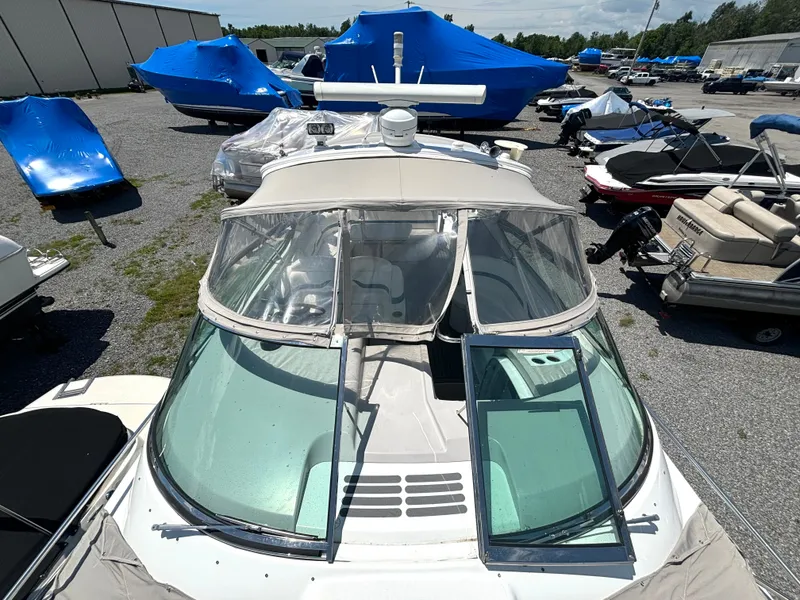 Slide: The Image of A 2006 Formula 400 Super Sport with an enclosed cabin and radar on the roof. - 12