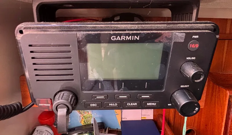 Slide: The Image of Garmin radio unit in a 1985 Nonsuch 30 Ultra. - 49