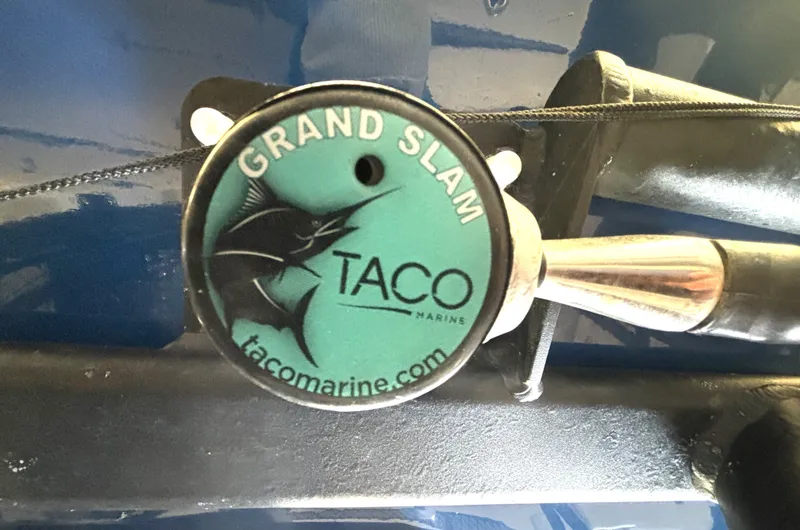 Slide: The Image of Close-up of a Taco Marine Grand Slam boat accessory with a swordfish logo. - 39