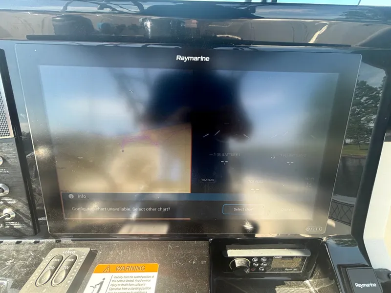 Slide: The Image of Raymarine navigation system on a 2019 Wellcraft 302 Center Console boat. - 26